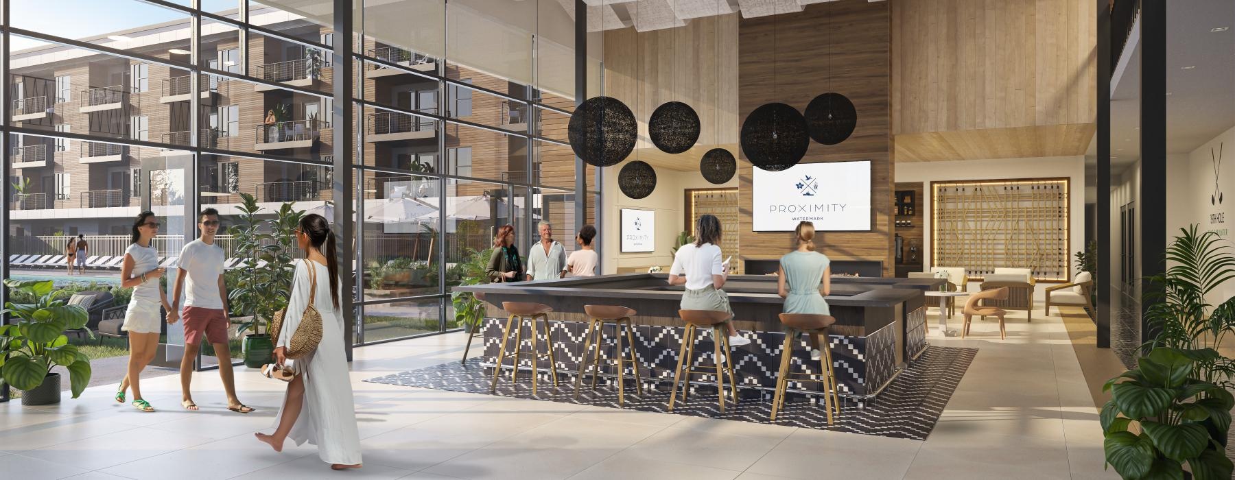 a group of people in a building with large windows and a fireplace